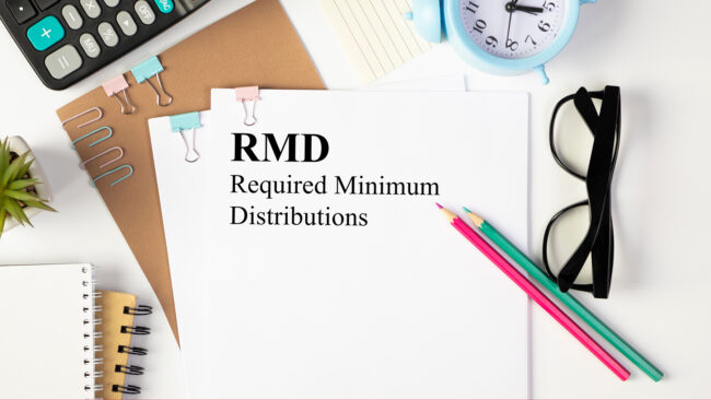 Paper with Required Minimum Distributions RMD on a table Secure Act 2.0 – Tax Planning Opportunities Related to Delayed Required Minimum Distribution Requirements